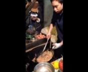 My favorite street vendor cooks up some special fried noodles for dinner.