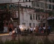 Mark Wahlberg, Jack Reynor, Nicola Peltz, T.J. Miller, running from a smoking Chevy Sonic Racer while filming Transformers 4 in Detroit at a warehouse located by the intersection of Harper and St. Antoine 08/14/13