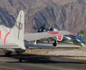 Attack on Pearl Harbor Commemorative Fly By of a Japanese Zero Fighter and VAL Dive Bomber at the Palm Springs Air Museum 2015. Zero Pilot Robert