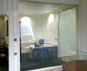 Smart glass partitions are one of Intelligent Glass&#39;s (https://intelligentglass.net) most popular products.nnThe switchable glass partition replaces fiddly meeting room blinds, allows plenty of light to flow through the space, gives a smart clean look, and also acts as a rear projection screen when needed. This particular installation is in the offices of a large UK organisation in London.nnSmart glass is designed to provide instant switchable privacy, with the reliability and ease of use of a l