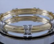 Custom bangle bracelet by Jim Omori. To book a free design consultation call (204) 951-7040 or visit www.omori.ca