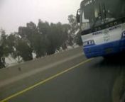I was traveling to Islamabad from Lahore on the 20th December 2014, and exited the Ravi Toll Plaza. I was in the last lane when I exited and there was a trailer in front of me, so I indicated my right signal seeing a bus in the side view mirror some 10 meters away and performed the lane change. Since we had exited the toll plaza our speeds were very low to start with. As soon as I had used my indicator he sped up started flashing and honking. I remained in the middle lane, so he overtook me via