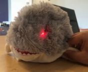 When a person touches the shark&#39;s tail, it makes its tail flaps and when its fin is pressed, the shark gets angry and its eyes light up as a respond. It detects pressure on top of its body via touch sensor and on its fin via force sensor. Using one servo motor and 2 LED lights, it flaps the tail and lights the eyes. Arduino, connected to a computer, is used for power source and hardware code.nnBackground music :nDennis Kuo - Tesseract