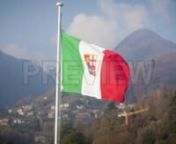 Get 100&#39;s of FREE Video Templates, Music, Footage and More at Motion Array: http://bit.ly/2SITwWM nnnGet this here: https://motionarray.com/stock-video/flag-of-italy-177830nnFlag Of Italy is a stock video that consists of great footage of the flag of Italy displayed on a flag pole outdoors. We also see the mountains and the cloudy sky in background. This 1920x1080 (HD) bit of footage is apt to use in any project that depicts Italy. Add this footage in your next edit, YouTube video, social media