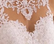 Layered, Frosted Venice and Chantilly Lace Appliqués on a Tulle Gown with Long, Full Overskirt Edged with Wide Scalloped Hemline and Slim Underskirt. Available in Three Lengths: 55″, 58″, 61″. Also Available in Sizes 16W to 32W as Style 5705W.