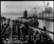 1958., USAnnTug w/ Admiral Rickoverfireboatsfrom dock as it docks, people waving.Sailors kissing wives etc., overhead of many sailors kissing, hugging girlfriends.n10:39:56Commander William Anderson, MCU; Rickover in MCU; MS together.nCold War; Atomic Energy; nNOTE:Sound is poor.Arrival in NYC after crossing Atlantic underwater &amp; after crossing under North Pole.