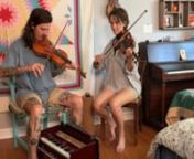 this is a traditional tune called sandy river belle played on fiddles and harmonium. tuning is FCGD. sofia sofia is abby flanagan and louis bicycle.
