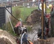 Video of a 100 meter deep geothermal drilling for installing a heat-exchange-probe in the earth, to be used for heating the newly build houses in Etten-Leur. By making use of geothermal energy, savings of 75% and more are made on the normal costs. By using a very light equipment, these guys are drilling 4 of these 100 meter deep holes each day, where the operators of huge machines constructed on special trucks and crawlers remain astonished.