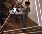 Interactive Telecommunication Program, NYUnClass: NIMEnA musical instrument made of elastic bands. The elastic bands control musical tension. Its shape reflects the tension in the music. It surrounds the performer.