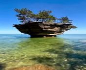 Enjoy quiet moments and stunning natural beauty on Turnip Rock Island, and explore the stunning views and tranquility that this wonderful natural site in the US state of Michigan offers. Indulge in its unique appeal and enjoy nature#Magnificence_of_Turnip_Rock #Beautiful_Views #Tranquility_of_Nature&#60;br/&#62;&#60;br/&#62;&#60;br/&#62;