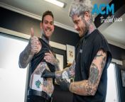 Launceston mayor Matthew Garwood has committed to the Tasmanian Devils AFL team with a tattoo of the new logo. Video by Aaron Smith