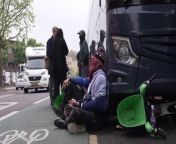 London protesters block coach taking asylum seekers to Bibby StockholmDozens of demonstrators in Peckham surround coach before it can take people to barge in Dorset