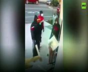 Madison Mavity, 24, and her husband were trying to defend a ransacked jewelry repair shop in the same building as their home.&#60;br/&#62;Footage shows the men attacking the building as Mavity confronts them. The men begin to walk away but one, in a bright orange hoody, suddenly turns and throws a punch at Mavity. Her husband, who is obscured from view, is attacked by two other men, one of whom uses a wooden plank to attack both victims.