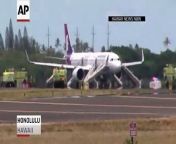 Hawaiian Airlines says seven people were taken to the hospital with smoke-related symptoms after a flight from Oakland, California, to Honolulu made an emergency landing because of smoke in the airplane.