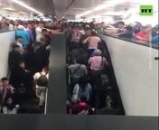 Footage from an overcrowded train station in Pantitlan, Mexico City, shows travelers piled up on an escalator because the platform was full. After a while, the escalator was disconnected. Four women received minor injuries in the incident.