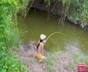 Beautiful Girl Fishing Big with Traditional Hook