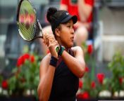 Naomi Osaka began her first Italian Open campaign in three years with a straight-sets win over Clara Burel