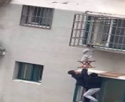 Neighbours rescue boy dangling from 4th floor window