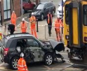 Footage shows the moment a car was pulled off the tracks after being crushed by a train at a crossing. &#60;br/&#62;&#60;br/&#62;The black Suzuki SUV was removed after it was hit by the 0908 train from Saltburn to Nunthorpe, near Redcar Central station, on May 1. &#60;br/&#62;&#60;br/&#62;The crumpled bonnet of the car can be seen barely hanging on – with the front bumper dragging along the ground. &#60;br/&#62;&#60;br/&#62;Network Rail staff were on scene to clear the area.&#60;br/&#62;&#60;br/&#62;Passerby Stanley Binns, 75 - who captured the footage - said: “I took the video from the top of a supermarket car park which overlooks the crossing. &#60;br/&#62;&#60;br/&#62;“The accident had already happened, people told me it happened about an hour before. &#60;br/&#62;&#60;br/&#62;“They reckoned the crossing light wasn’t working and the driver drove on and the train hit the side of it. &#60;br/&#62;&#60;br/&#62;“When I got there you could see the end of the train sticking out.” &#60;br/&#62;&#60;br/&#62;Karen Duffy, Operations Director for Network Rail&#39;s North &amp; East route, said: &#92;