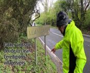 Father and son clean Ceredigion's village signs from love games bangla village video 2019k