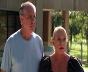 Adrienne and Glenn Pearson joined about 700 neighbours for a court showdown against a housing development on an abandoned golf course. Now the Queensland government has stepped in and is considering the use of special override powers to free up land for houses.